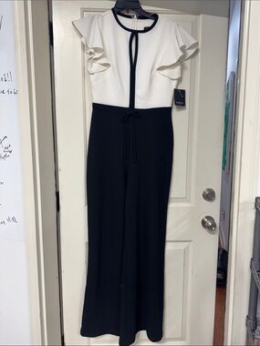 MARINA White and Black Ruffle-Sleeve Tie-Waist Jumpsuit